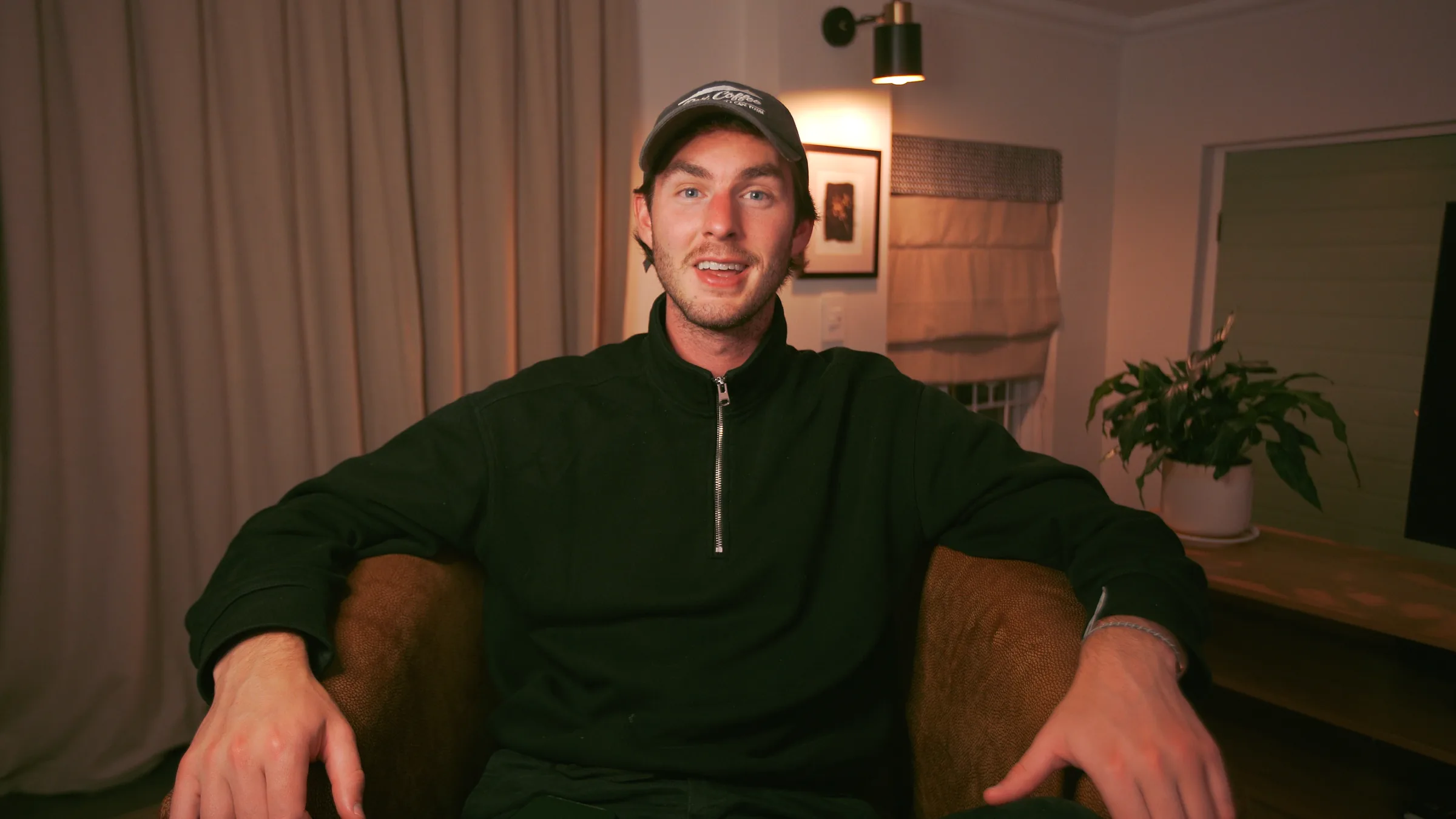 Zack Allen seated for a video recording